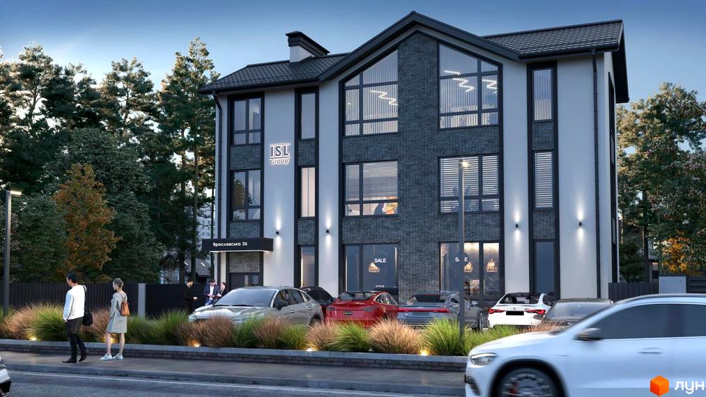 Будівельний проєкт на вул. Ярославська, 26в. Фасад будівлі поєднує білу штукатурку та темну цеглу, великі вікна, перед будинком висаджені декоративні трави та дерева.