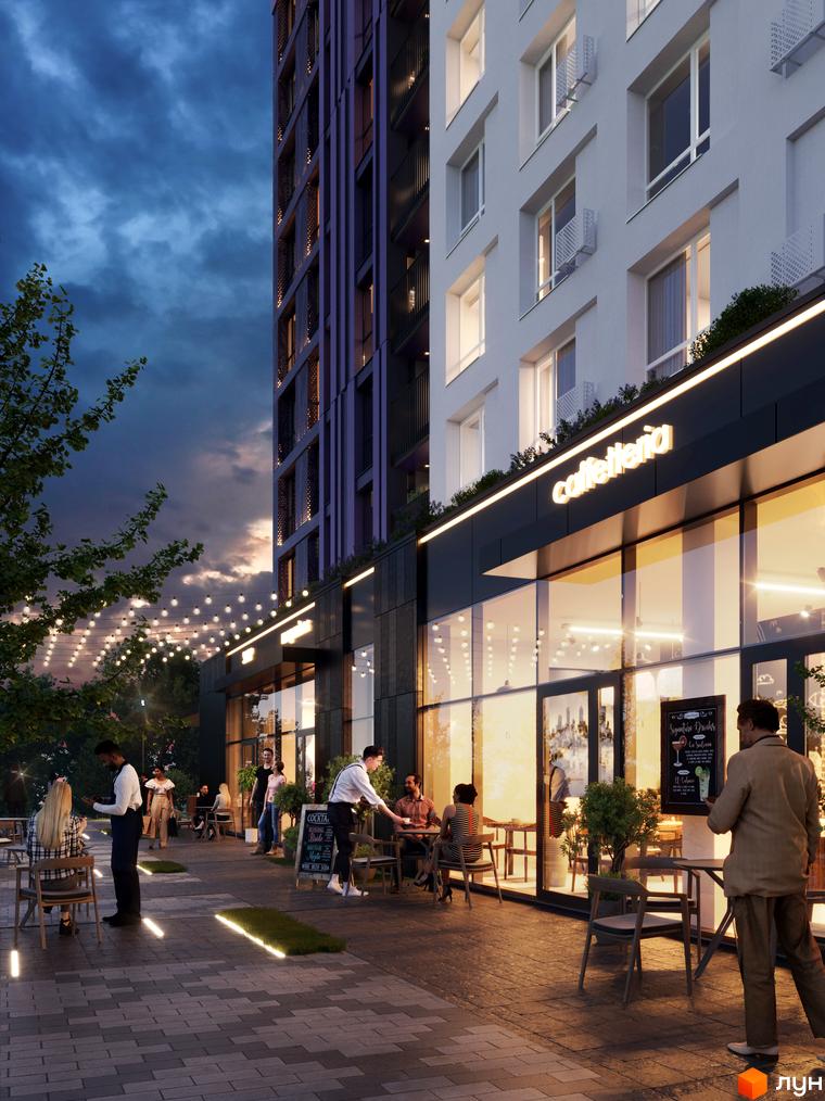 Житловий комплекс Lavanda Park з багатоповерховим будинком та світлим фасадом. Прибудинкова територія має кафе з літньою терасою, освітленою гірляндами та підлоговими ліхтарями.