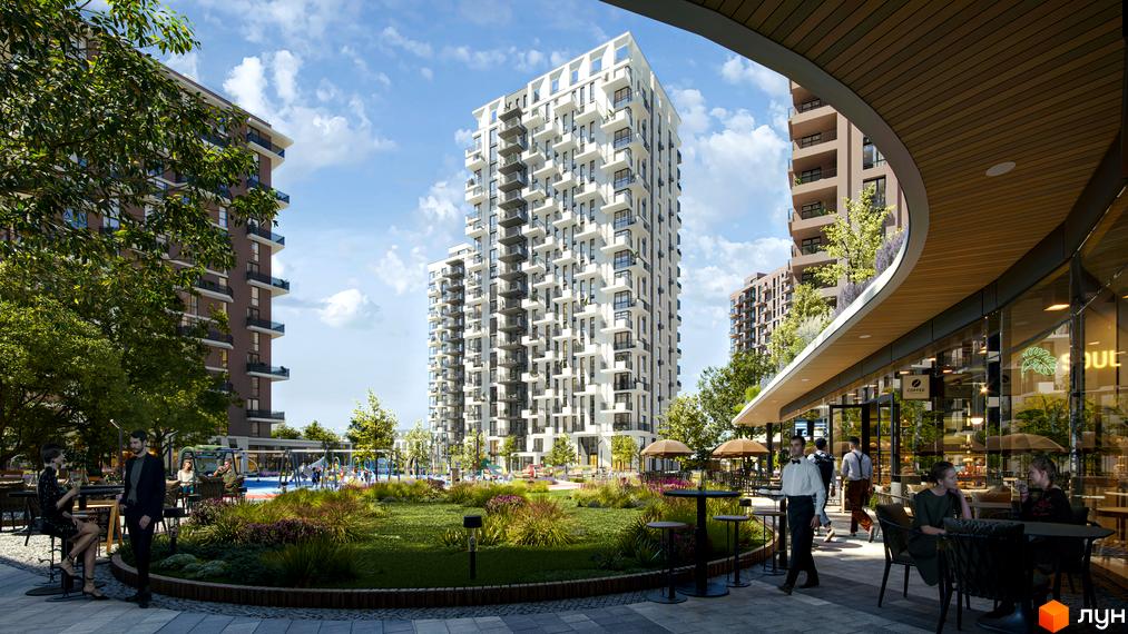 Житловий комплекс Central Park Vinnytsia з білою фасадною частиною та численними балконами, оточений зеленою прибудинковою територією з зонами відпочинку та дитячим майданчиком.