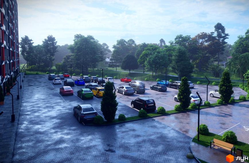 Зовнішній вигляд багатоповерхового будинку ЖК Dream Park з парковкою та зеленими насадженнями на прибудинковій території.