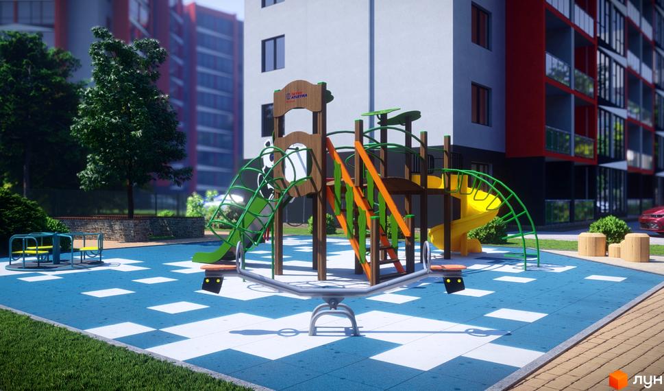 Дитячий майданчик у дворі ЖК Dream Park. На території є гірки, гойдалки та карусель. Поруч розташовані будинки з червоними балконами.