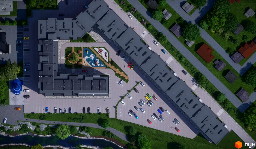 Вигляд зверху на Житловий комплекс Dream Park з облаштованою територією, дитячим майданчиком та паркінгом для мешканців.