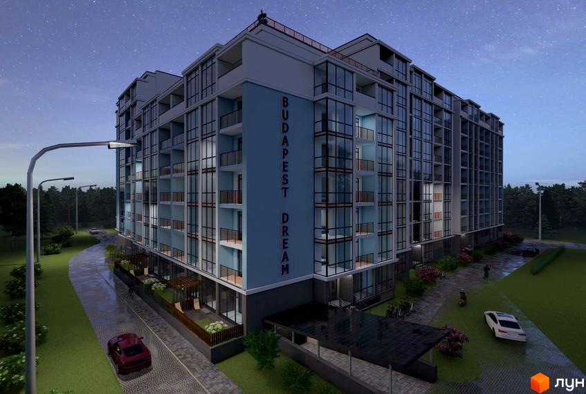 Житловий комплекс Budapest Dream з великими вікнами та балконами, розташований на території з газонами, деревами та парковкою. На фасаді будівлі напис назви комплексу.