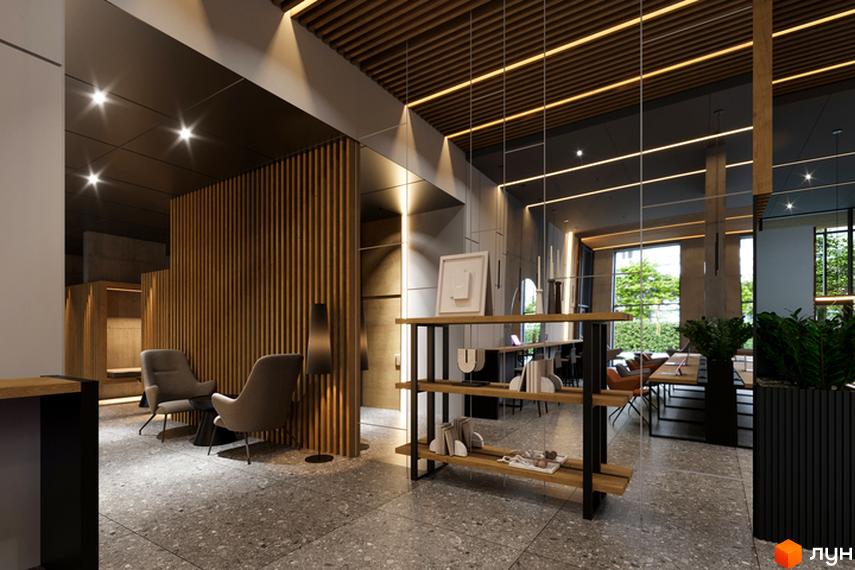 Інтер'єр зони очікування в Житловому комплексі Standard One Obolon з м'якими кріслами та дерев'яними перегородками.