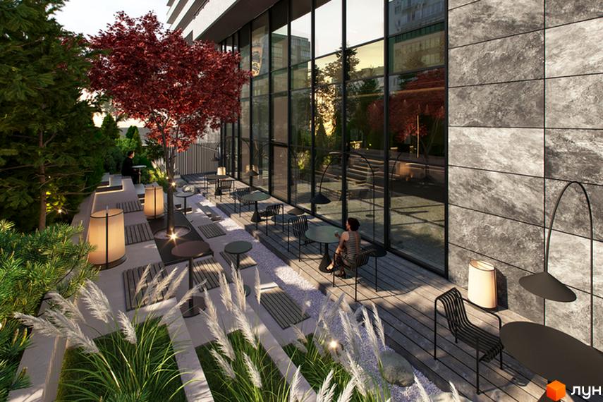 Зображення тераси з меблями біля великого вікна Будівельного проєкту Standard One Obolon. Навколо багато зелені та дерев.