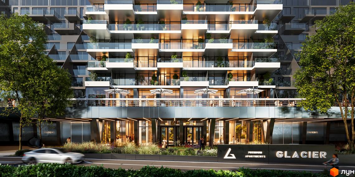 Апарт-комплекс GLACIER з виступаючими балконами та скляними фасадами, перед яким розташована доглянута прибудинкова територія з деревами та дорогою.