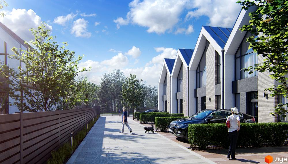 Таунхауси FreeDOM's з двосхилими дахами та великими вікнами, розташовані вздовж вимощеної доріжки з кущами та автомобілями.