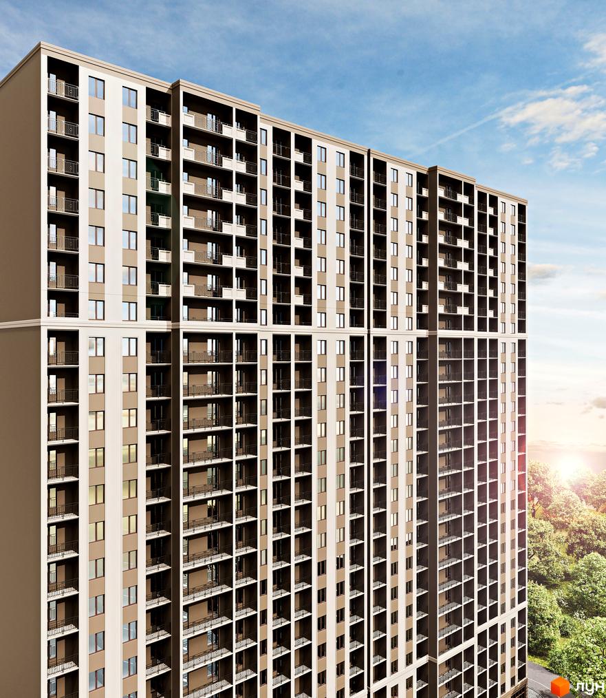 Зовнішній вигляд житлового комплексу Еллада з численними балконами та вікнами на тлі блакитного неба та зелених дерев. Новобудова з багатоповерховою архітектурою.