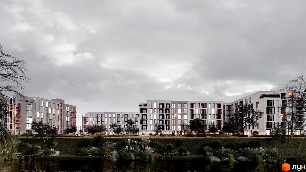 Комплекс Набережний: багатоповерхові будинки зі світлими фасадами та контрастними віконними рамами, розташовані біля водойми з рослинністю.