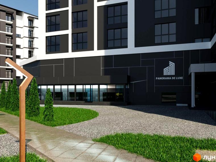 Зовнішній вигляд новобудови ЖК PANORAMA DE LUXE з темним фасадом та великими вікнами. На прибудинковій території зелена галявина та доріжка.