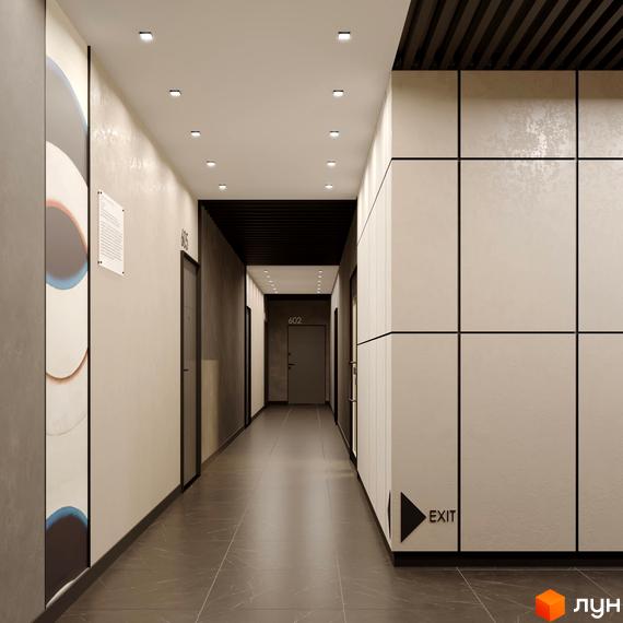 Коридор в ЖК BORGO VERDE з дверима та покажчиком виходу. Світла обробка стін та підлоги, точкові світильники на стелі.