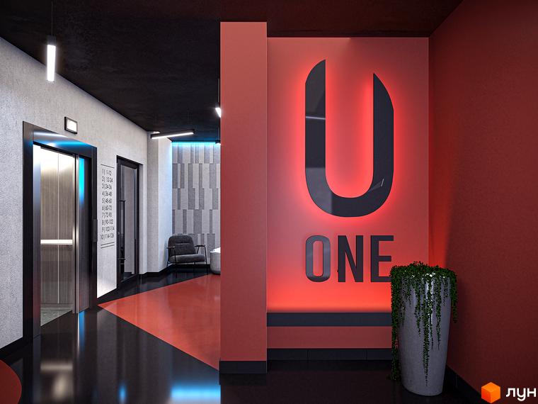 Інтер'єр ЖК U One: просторий хол з ліфтом, великим логотипом та рослинами. Яскраве освітлення підкреслює архітектурні особливості.