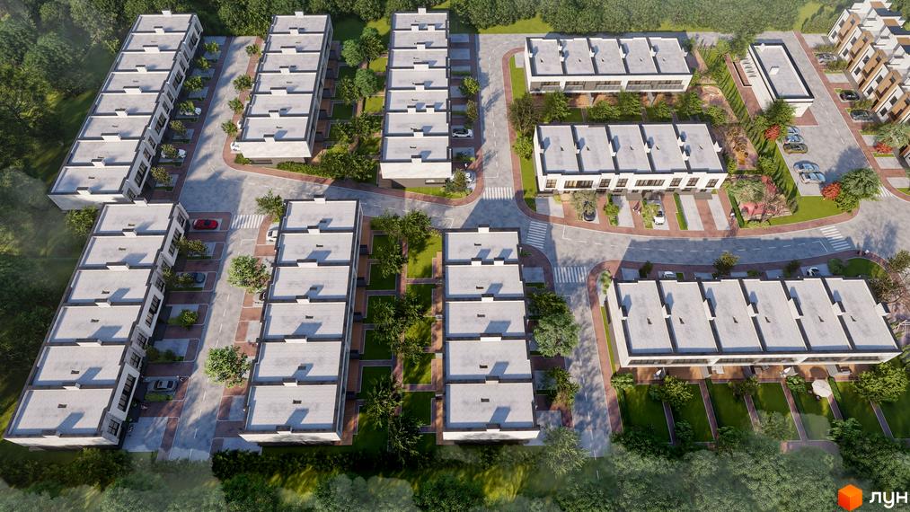 Вид на таунхауси ЖК „Мальви 2“ з висоти пташиного польоту. Білі будинки з плоскими дахами, доглянута прибудинкова територія з деревами та газонами.