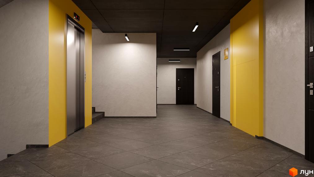 Сучасний дизайн холу житлового комплексу Весняний з елементами жовтого кольору та ліфтом. Опис інтер'єру новобудови для потенційних покупців.