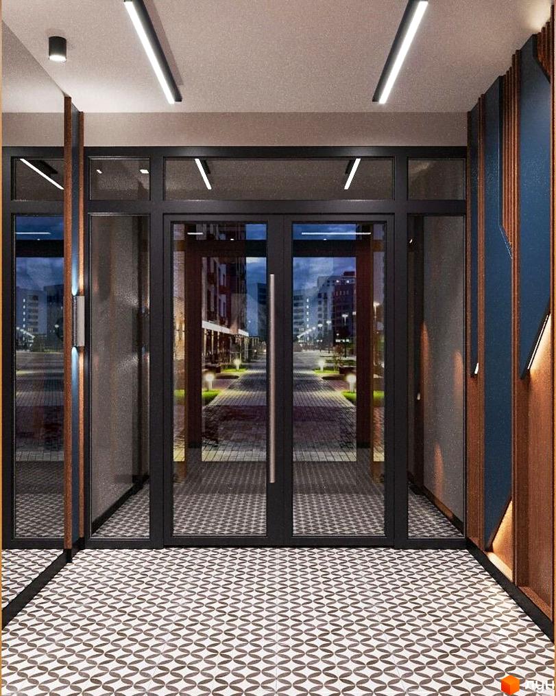 Сучасний вхід у житловий комплекс Молодість з подвійними скляними дверима та елегантним освітленням. Територія перед будинком вимощена плиткою та освітлена ліхтарями.