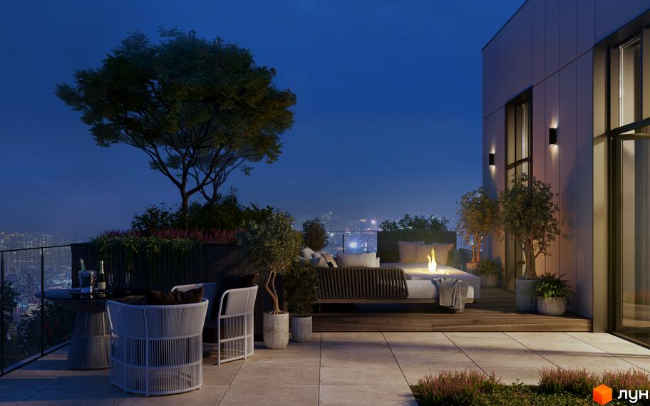 Вид на терасу з меблями та рослинами на даху будинку ЖК BORGO VERDE. Вечірнє освітлення, вогонь у центрі, навколишній пейзаж.