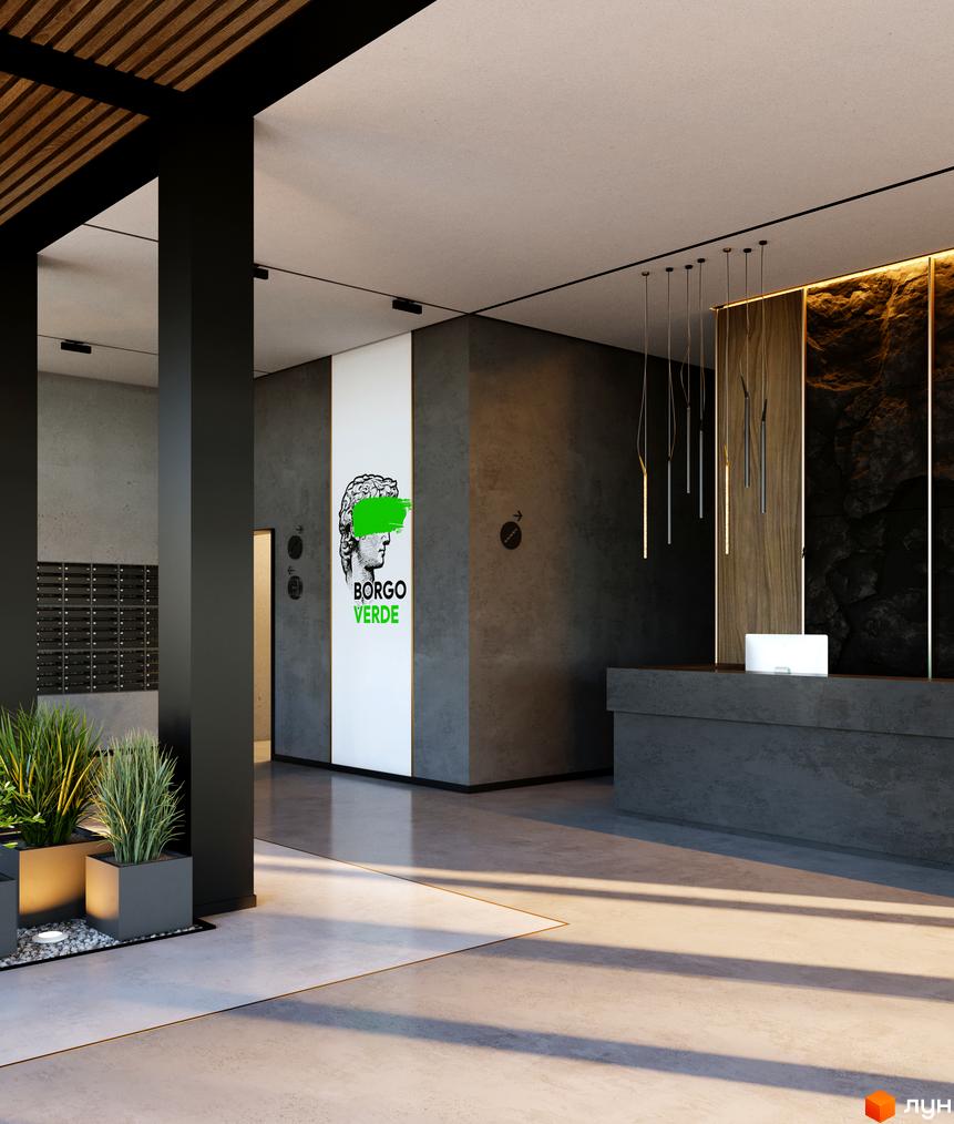Інтер'єр холу ЖК BORGO VERDE з рецепцією, оздобленням стін та підлоги. На стіні логотип житлового комплексу, поруч зелені рослини.
