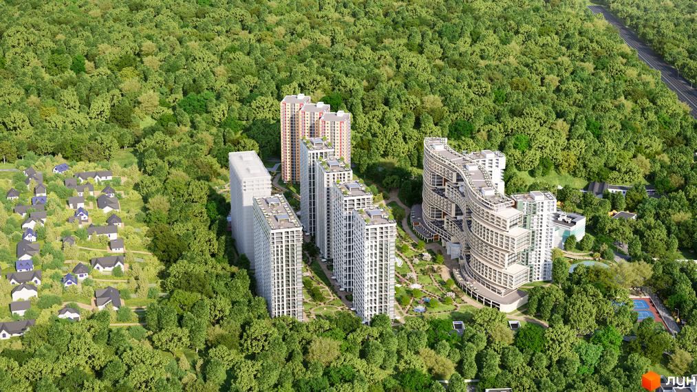 Вид на житловий комплекс Central Hills з висоти пташиного польоту, що демонструє сучасні багатоповерхові будинки та зелену прибудинкову територію з низькоповерховою забудовою.