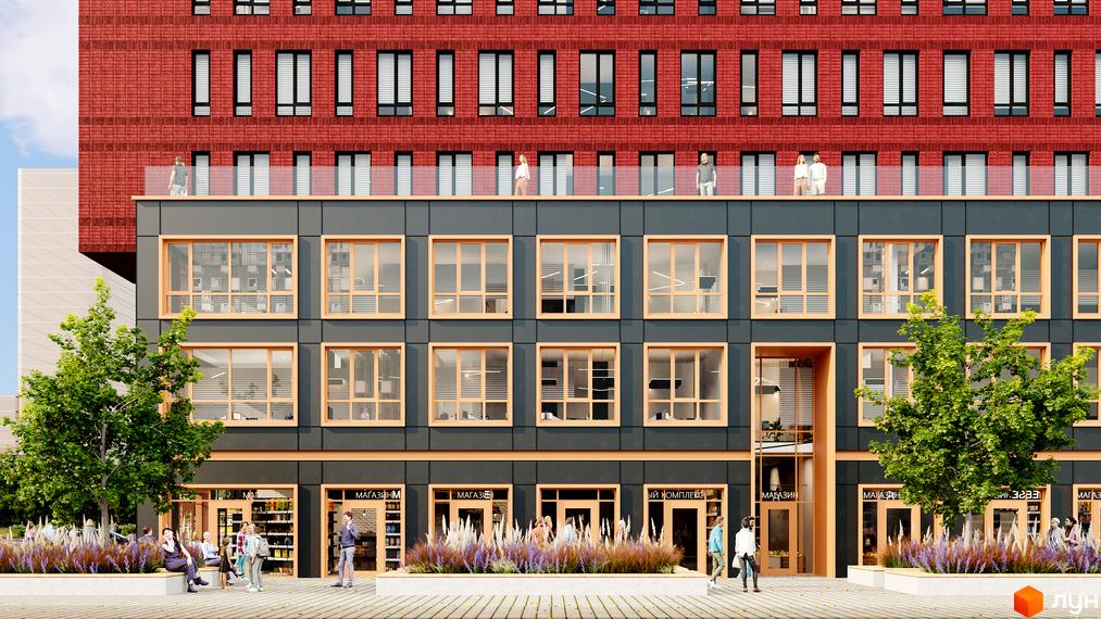 Багатоповерховий будинок БФК Industrial з фасадом з червоної цегли та великими вікнами. На першому поверсі розташовані магазини, перед будинком висаджені рослини.