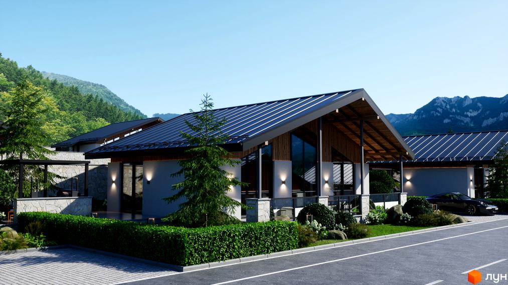 Котеджне містечко Chalet Berghouse з темним металевим дахом та дерев'яними елементами фасаду, оточене зеленню та гірським пейзажем.