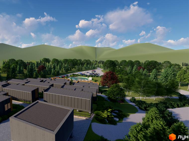 Зображення Котеджного містечка КРАСІЯ РЕЗІДЕНС з будинками та зеленою територією. Вид на гори та блакитне небо з хмарами.