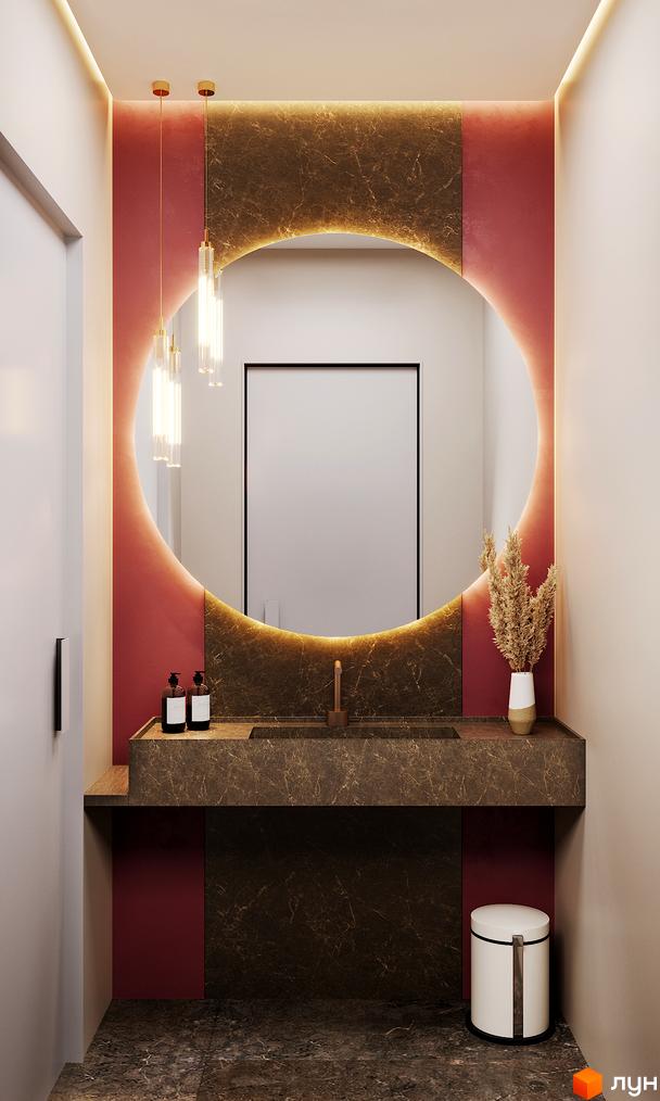 Інтер'єр ванної кімнати в ЖК Mont Blan з круглим дзеркалом, підсвічуванням та декоративними елементами.