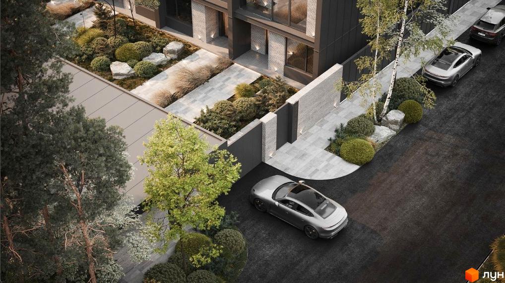 Таунхаус Forest Lane з сірим фасадом та білою цегляною обробкою, прибудинкова територія з доріжками, кущами та деревами, два автомобілі на парковці.