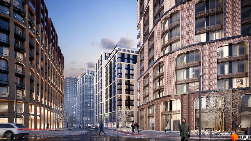 Житловий комплекс LUCKY LAND: багатоповерхові будинки з цегляними фасадами та арковими вікнами, вулиця з пішоходами та деревами взимку.