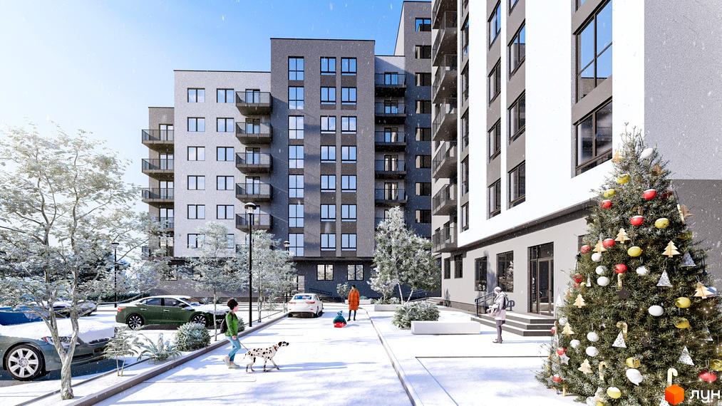 Житловий комплекс Франко взимку: багатоповерхові будинки з балконами, засніжена територія, прикрашена ялинка.