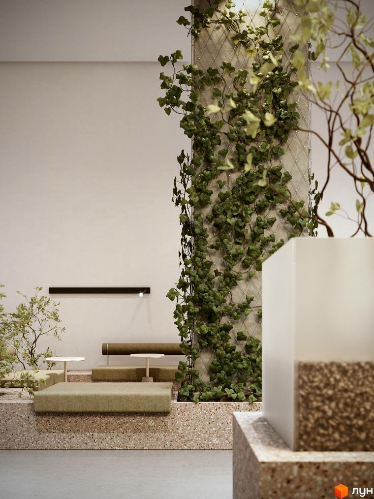 Інтер'єр зони відпочинку в ЖК TRIVIUM з рослинами та лаконічними меблями. Стіни оздоблені декоративною штукатуркою, підлога - тераццо.