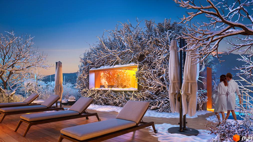 Апарт-комплекс Mountain Residence з відпочинковою зоною на терасі, оточеною зимовим ландшафтом. На терасі розташовані шезлонги та парасольки, а всередині будівлі видно людей в сауні.