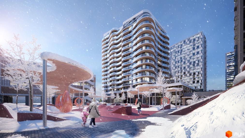 Житловий комплекс Creator City взимку. Сучасні будівлі з хвилястими фасадами та скляними балконами. На прибудинковій території дитячий майданчик зі снігом та засніжені дерева.