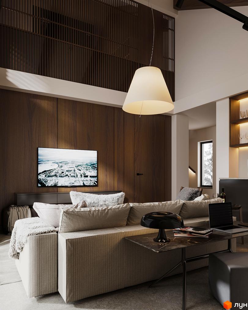 Інтер'єр вітальні в таунхаусі Green Rest. Світла м'які меблі, велика люстра, телевізор на стіні з дерев'яними панелями.