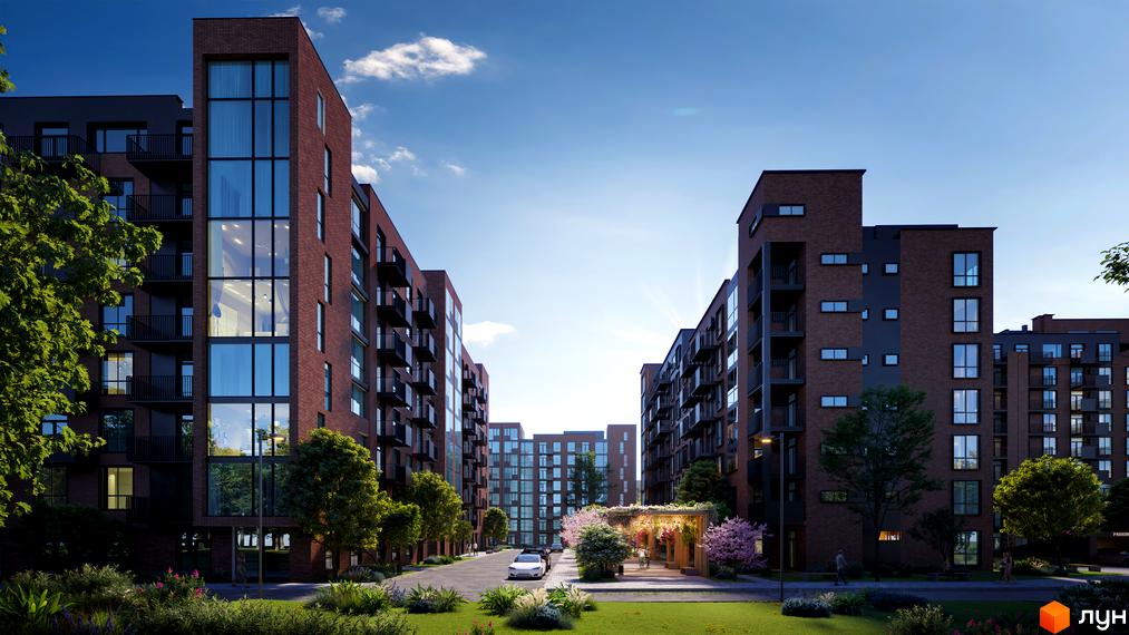 Житловий комплекс Royal Town з цегляними фасадами та великими вікнами. На прибудинковій території зелений газон, дерева та квіти.