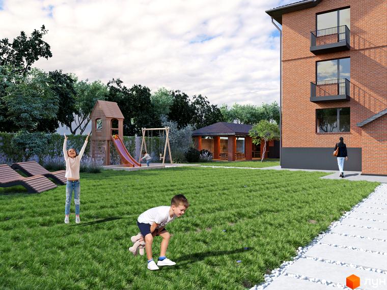 Клубний будинок „Проців-1 (Лазурний)“ з цегляним фасадом та балконами. На прибудинковій території дитячий майданчик та зелена галявина.