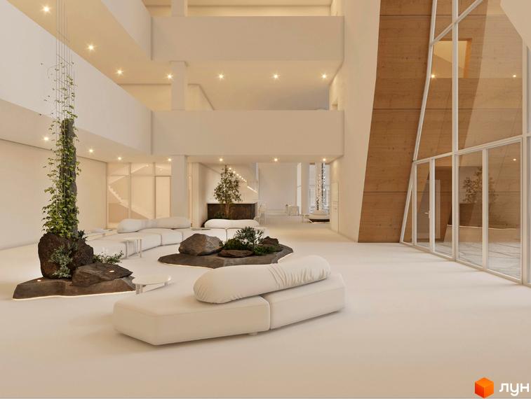 Просторий хол житлового комплексу AL'PAKI з білими диванами, натуральним каменем та зеленню. Великі вікна виходять на дерев'яну стіну та зелену зону.