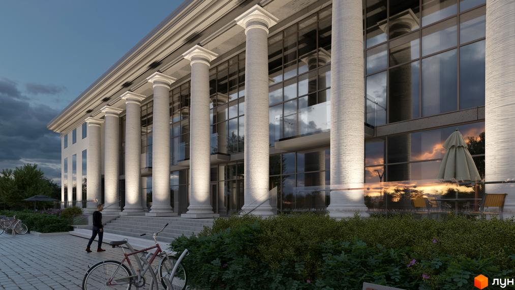 Житловий комплекс Park Residence з колонами та великими вікнами, освітлений ввечері. Поруч розташовані велосипеди та зелені насадження.