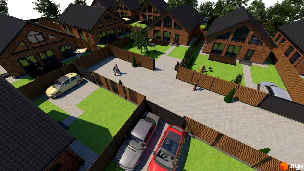 Котеджне містечко Нова Баварія: двоповерхові будинки з цегляними фасадами та темними дахами, оточені доглянутими газонами та вимощеними доріжками.