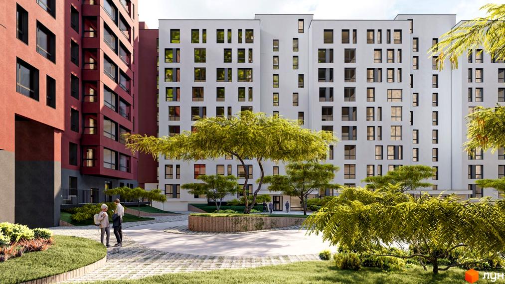 Житловий комплекс Паркове містечко (7 черга) з білими фасадами та червоною цегляною будівлею. На прибудинковій території розташовані дерева та зелені насадження.