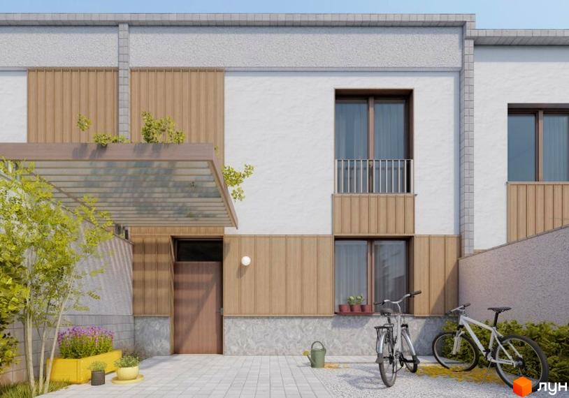 Фасад Таунхаусу Luxor Gardens з білими стінами та дерев'яними панелями, перед будинком вимощена територія з рослинами та двома велосипедами.