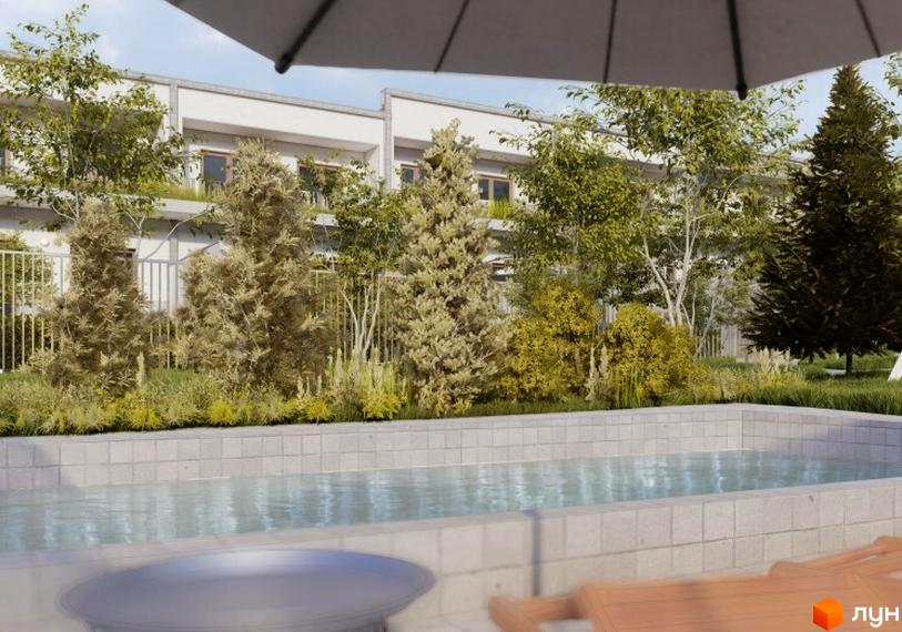 Таунхаус Luxor Gardens: фасади будівель світлого кольору, оточені зеленою територією з басейном та різноманітними деревами.