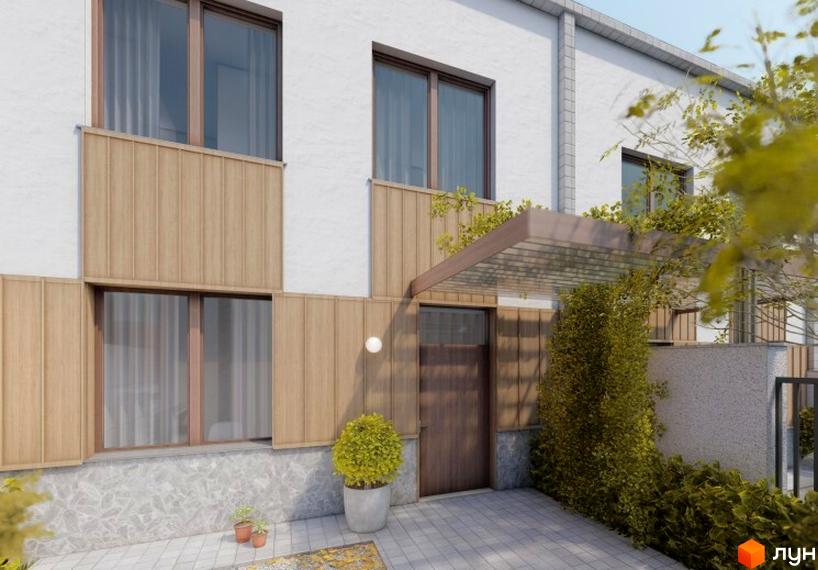 Таунхаус Luxor Gardens з білими стінами, дерев'яними панелями та великими вікнами. Прибудинкова територія озеленена, з вимощеною доріжкою.