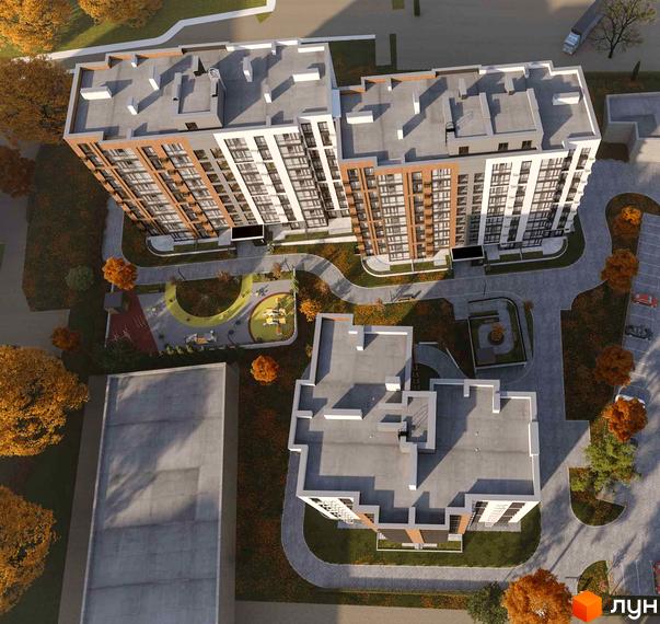 Вигляд зверху на Житловий комплекс HARMONY for you: багатоповерхові будинки з облаштованою прибудинковою територією та паркінгом.