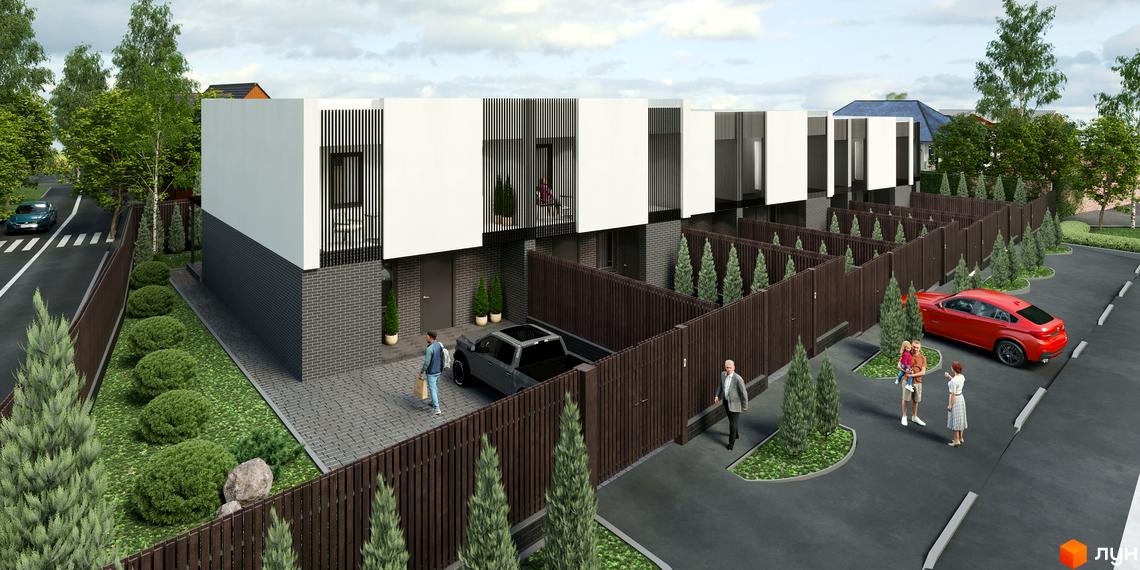 Таунхаус Новоолександрівський – це двоповерхові будинки з білими фасадами та темною цегляною основою, розташовані на закритій території з доглянутими газонами та парканом.