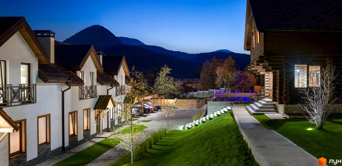 Зображення сторінки житлового комплексу Apartel Shayan Villas. На фото видно будинки з білими стінами та коричневими дахами, а також доглянуту прибудинкову територію.