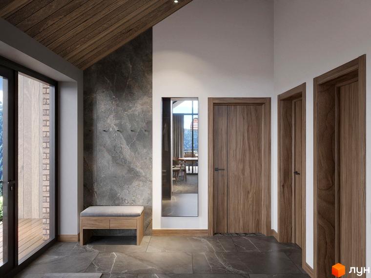 Інтер'єр передпокою в Apartel Shayan Villas з дерев'яними дверима та сірою мармуровою стіною.