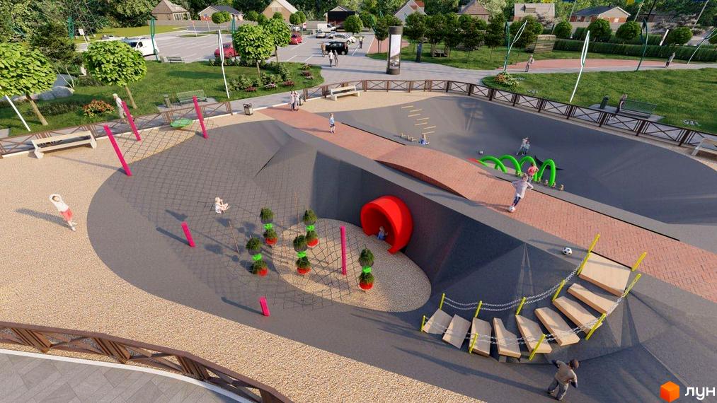 Дитячий майданчик в ЖК Millennium Park з гірками, тунелем та зонами для ігор. Територія навколо майданчика облаштована лавками та зеленими насадженнями.