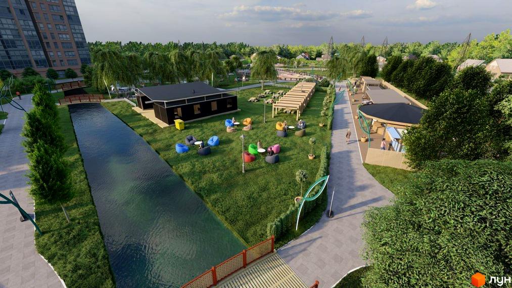 Житловий комплекс Millennium Park з зоною відпочинку біля води. На території є кафе, зелені зони та зручні місця для дозвілля.