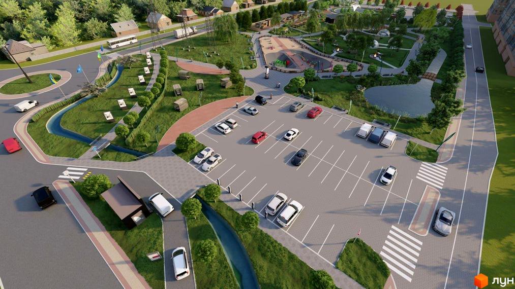 Житловий комплекс Millennium Park з парковкою та зеленими зонами. На зображенні видно будинки, дороги та паркувальні місця.