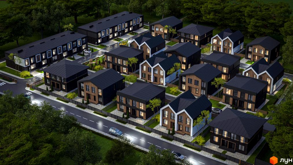 Котеджне містечко Garden Village Ozerne. Сучасні двоповерхові будинки з темними дахами та фасадами з дерева та чорного кольору, розташовані на доглянутій території з деревами та освітленою дорогою.